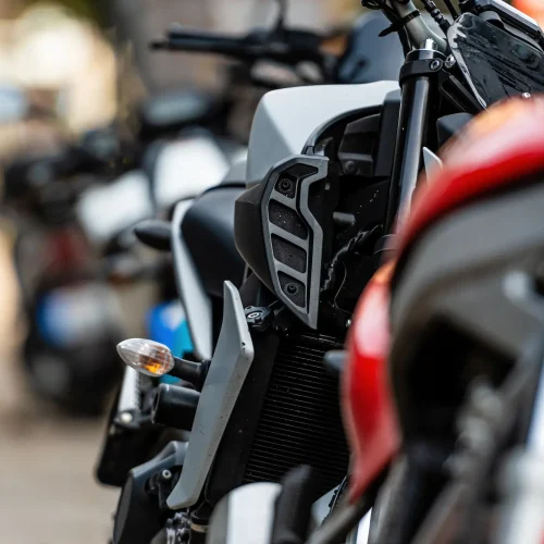 a-row-of-motorcycles-parked-on-the-side-of-the-str-2025-03-16-10-59-06-utc