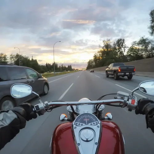 riding-a-motorcycle-during-a-vibrant-sunset-2025-03-13-09-17-23-utc